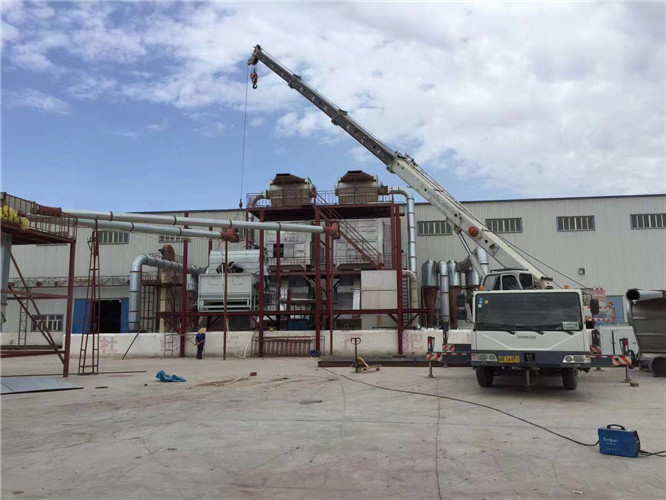 金塔县“手脚齐动”—— 吊车的 “协同作业” 技术